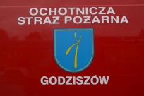 Napis na drzwiach samochodu strażackiego - Godziszów