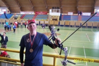 Przemysław Konecki z łukiem